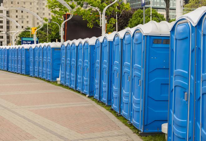 a row of portable restrooms at a fairground, offering visitors a clean and hassle-free experience in conneaut